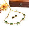 Gold tone green lotus necklace J165