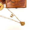 Gold-toned long chain with kathakali pendant J052