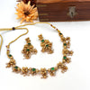Gold plated green stone flower design necklace J181