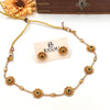 Gold tone flower design necklace 182